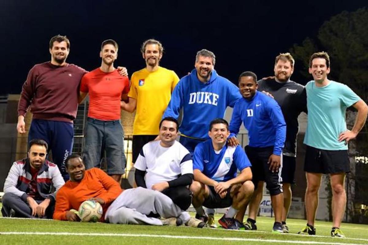 Eleven males on a soccer field